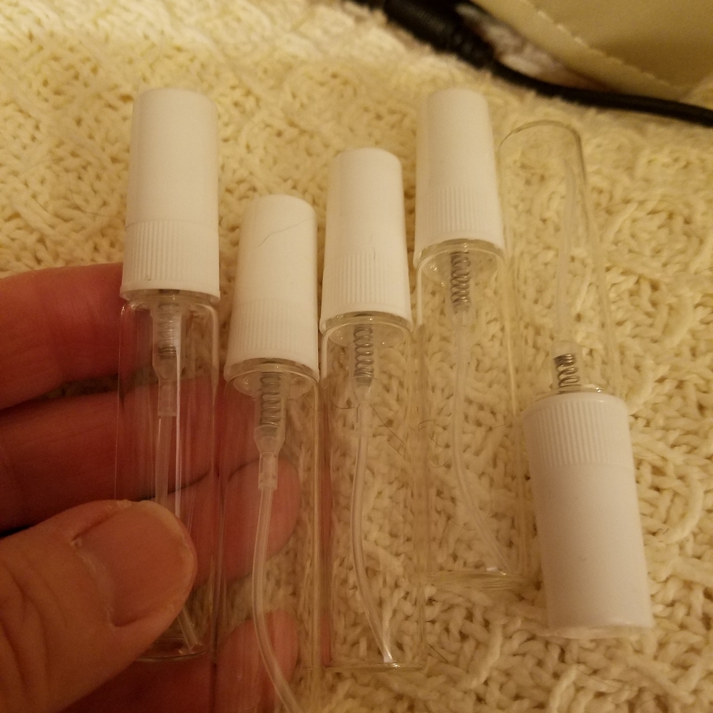 This listing is for 5 refillable empty glass perfume spray bottles with white at